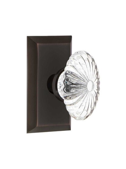New York Rosette Door Set with Oval Fluted-Crystal Glass Knobs in Timeless Bronze.